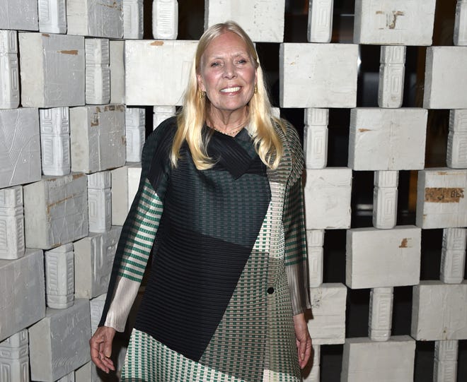 FILE - In this Oct. 11, 2014 file photo, Joni Mitchell arrives to the Hammer Museum's "Gala In The Garden," in Los Angeles. Mitchell’s friend and conservator says it was an aneurysm that sent the folk singer to the hospital in March 2015. Conservator Leslie Morris acknowledged the aneurysm in a statement posted on Mitchell’s website on Sunday, June 28, 2015, providing the first significant details on Mitchell’s health status in the months since an ambulance was sent to her Los Angeles house to take her to the hospital. (Photo by John Shearer/Invision/AP, File)