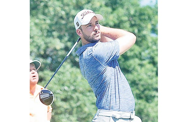 Jordan Boerio gets off to a strong start during Sunday’s second round at the Dink’s Bartlesville Men’s and Senior Golf Championships, hosted by Adams Municipal Golf Course. After shooting 67 on Saturday, Boerio grinded out a 73 — in much more difficult circumstances — on Sunday to capture the city crown by six strokes. Two-time defending champ Spencer King also turned in a valiant effort to come in second, with a two-day total of 146. Mike Tupa/Examiner-Enterprise