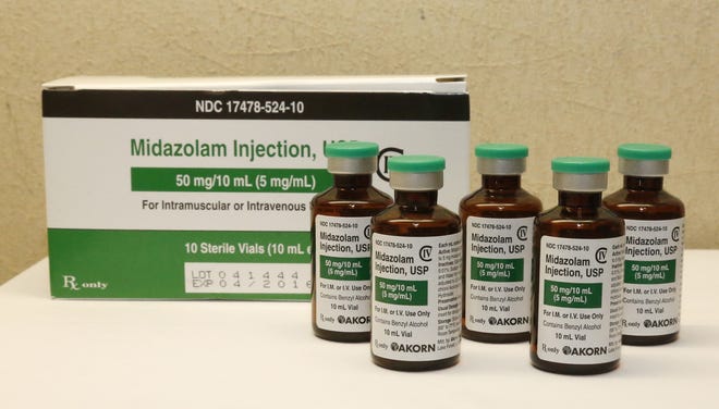 This Friday, July 25, 2014 file photo shows bottles of midazolam at a hospital pharmacy in Oklahoma City. On Monday, June 29, 2015, The Supreme Court voted 5-4 in a case from Oklahoma saying that the sedative midazolam can be used in executions without violating the Eighth Amendment prohibition on cruel and unusual punishment. AP Photo/Sue Ogrocki, File