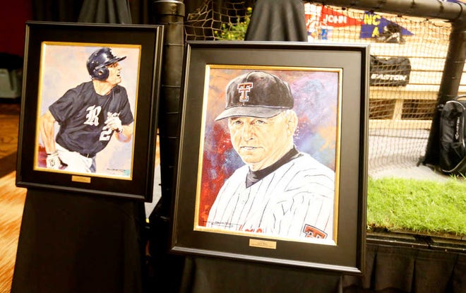 Pictures of Lance Berkman, left, and Larry Hays line a table at the College Baseball Night of Champions on Monday in Lubbock.