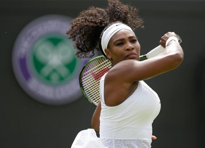 Serena Williams plays a return to Margarita Gasparyan during their women's singles first-round match at the All England Lawn Tennis Championships in Wimbledon, London, on Monday. Photo by AP