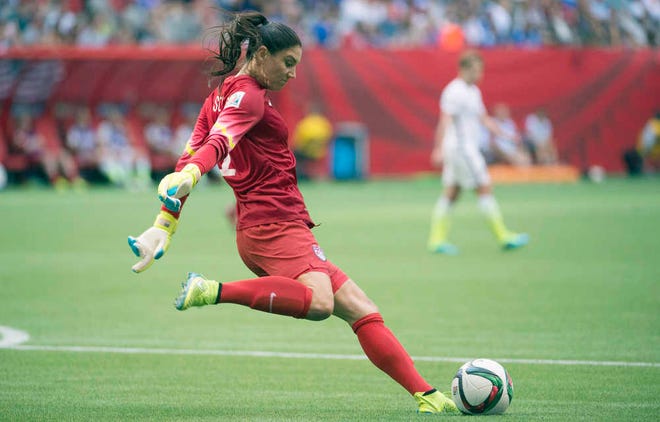 United States goalkeeper Hope Solo prepares to kick the ball against Nigeria at the Women's World Cup on June 16 in Vancouver, New Brunswick, Canada. Solo will be facing German goalie Nadine Angerer in today's semifinal match. (Jonathan Hayward/The Canadian Press via AP)