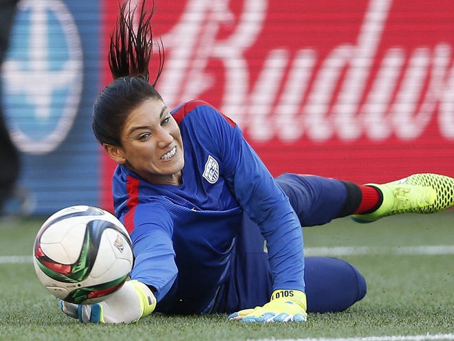United States goalkeeper Hope Solo warms up prior to a FIFA Women's World Cup soccer match against Sweden in Winnipeg, Manitoba, Canada, Friday, June 12, 2015.