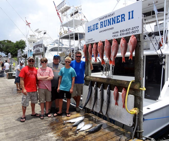 Texas anglers on the Blue Runner II with Capt. Tommy Carter came in with several red snapper and four king mackerel.