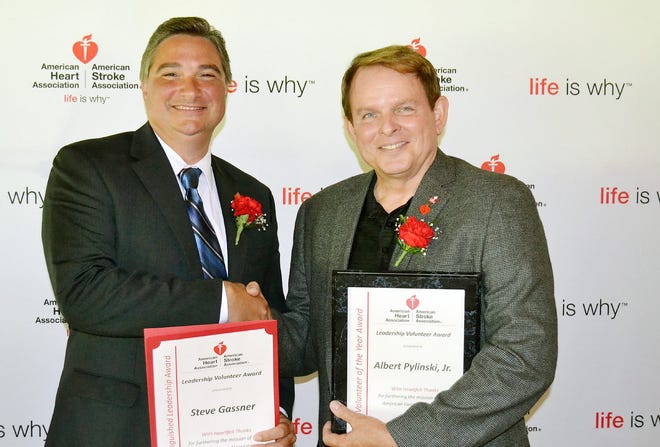 The Greater Utica Division of the American Heart Association/American Stroke Association honored 20 individuals and organizations at its annual Leadership Volunteer Awards Ceremony. From left are Distinguished Leadership Award recipient Steve Gassner and Volunteer of the Year Albert Pylinski, Jr. SUBMITTED PHOTO