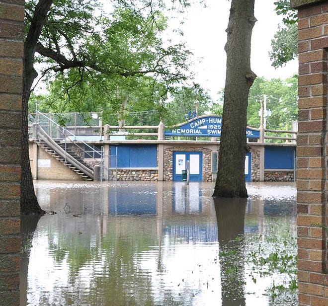 The Camp-Humiston Memorial Swimming Pool in Chautauqua Park became an island over the weekend due the rising water level in the Vermilion River.