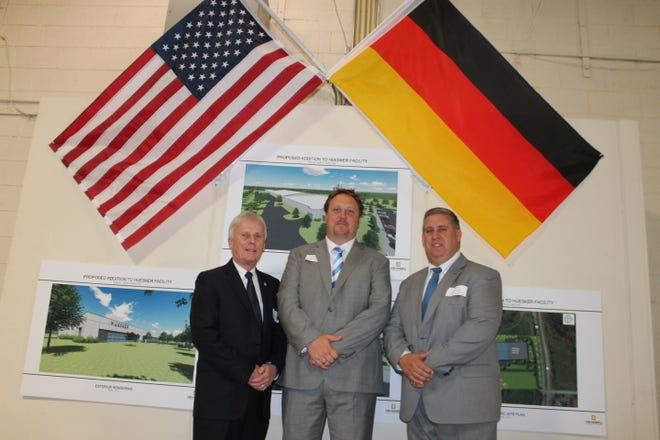 From left, Eddie Holbrook of the Cleveland County Board of Commissioners, poses with Sven Schroer, CEO of HUESKER Inc., and Jason Falls, Chairman of the Cleveland County Board of Commissioners.