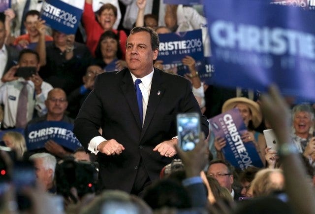 Republican U.S. presidential candidate and New Jersey Gov. Chris Christie stands before supporters as he formally announces his campaign for the 2016 Republican presidential nomination, during a kickoff rally at Livingston High School in Livingston, New Jersey, June 30, 2015. REUTERS/Brendan McDermid