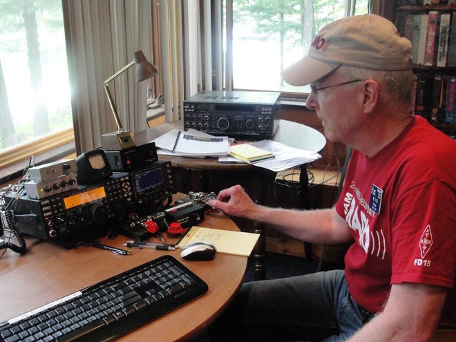 George Allison uses a Morse Code amateur radio setup to log the number of contacts he makes over the 24-hour field day. Courtesy photo / Betsy Levinson