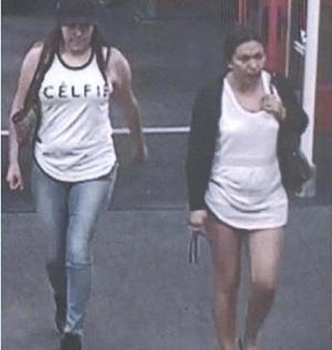 Evesham police released this surveillance image of two people suspected of stealing a wallet from a woman's purse and then using the credit cards to purchase over $8,000 worth of gift cards from a Target store.