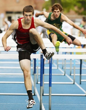 Old Rochester's Kevin Saccone made tremendous improvements as the spring track season progressed and he saved the best for last in the 110-meter hurdles and the long jump at the New England Championships. MIKE VALERI/THE STANDARD-TIMES
