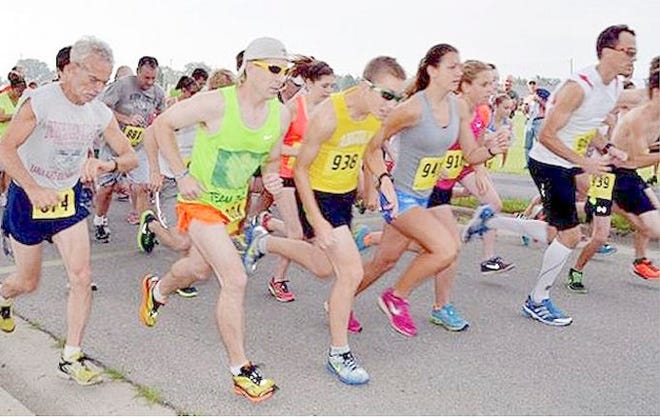 Many joined the benefit run in a previous year at Heritage Park. File Photo