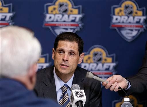 Boston Bruins general manager Don Sweeney talks with members of the media before the start of the 2015 NHL draft last Friday in Sunrise, Fla. AP Photo