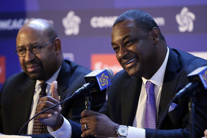 In this Mar. 12, 2015 file photo, CONCACAF President Jeffrey Webb, right, speaks, as Philadelphia Mayor Michael Nutter looks on during a Confederation of North, Central America and Caribbean Association Football news conference in Philadelphia