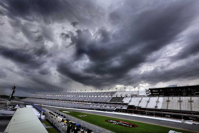Joe Burbank Orlando Sentinel Storms clouds loom over Daytona International Speedway on Saturday. The weather washed out Sprint Cup qualifying.