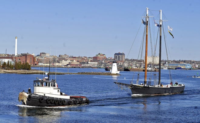 Pulled along by the tug Jaguar the schooner Ernestina departs New Bedford for Boothbay Harbor restoration shipyard in Maine earlier this year. DAVID W. OLIVEIRA/STANDARD-TIMES SPECIAL