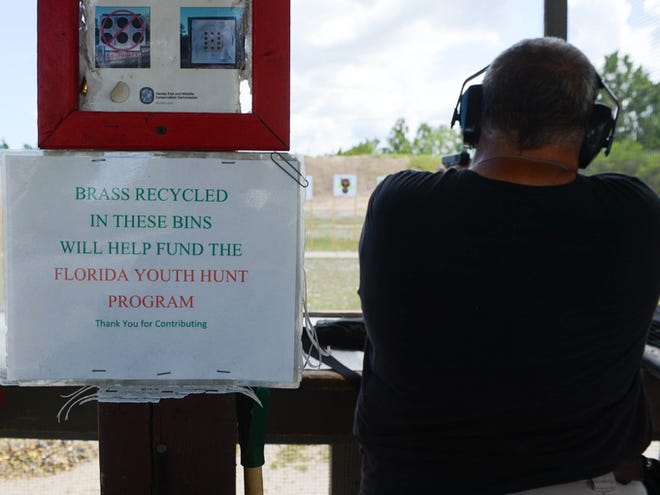 The handmade signs that falsely claim money from donated spent brass will go to charity were still posted on the firing lines at the Cecil M. Webb shooting range.