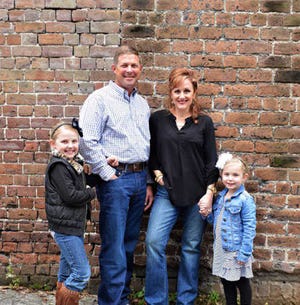 Photo courtesy of Donna Von Bruening-From left to right: Kate, Rob, Maggie and Anna Puccini were all affected when Anna was diagnosed with Type 1 diabetes. This includes changes made by both parents to accomodate Anna's need for insulin as well as changes for Kate, Anna's sister, who had to accept the amount of attention her sister gets because of the diagnosis.