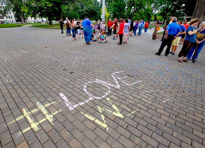 Capitol Police spoke with several protestors during Friday afternoon's rally at the Statehouse after some had written messages on the sidewalk with chalk. According to the Capitol police, chalk has not been allowed on the walkways, walls, or stairs of the Capitol since the completion of the renovation.