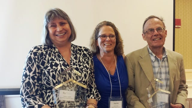 Jayne Colino, center, director, Newton Senior Center and past president, MCOA, presents MCOA’s Innovator of the Year Award to Ruthann Dobek, left, and Frank Caro, co-chairs of Brookline Community Aging Network.