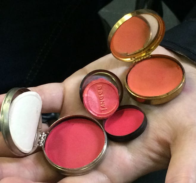 Historic makeup: three actual tins of blush from the 1920s.