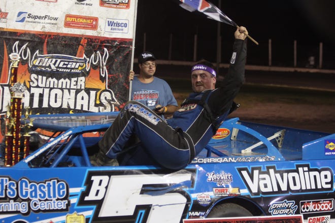 Super pro late model driver Brandon Sheppard celebrates his victory in the Graue Inc. DIRTcar Summer Nationals Hell Tour race at Lincoln Speedway Monday night. Photos by Bill Welt/The Courier