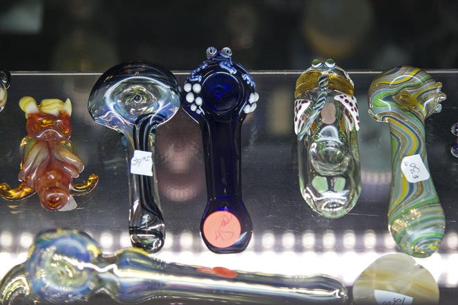 At Magic Mushrooms gift shop, Pinsent sells an array of gifts, hand-crafted mushroom lamps, and glass pipes, but he does not sell marijuana. (Julia Reihs/The Register-Guard)