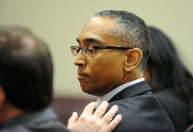 Suspended DeKalb County CEO Burrell Ellis appears in court Wednesday, July 1, 2015, in Decatur, Ga. Ellis, who is accused of pressuring vendors for campaign contributions, was found guilty of perjury and attempted theft by extortion on Wednesday according to the Atlanta Journal-Constitution. (Kent D. Johnson/Atlanta Journal-Constitution via AP)