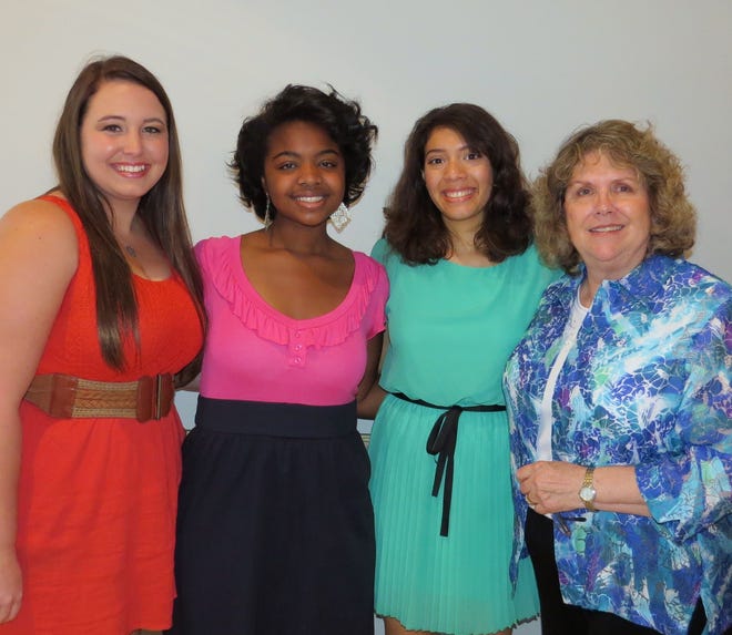 The Palmetto Club's Scholarship Chair Victoria Teel, right, presents $1,000 scholarships to, from left, Taylor Howland of Seabreeze High School, Kristen Woody of Atlantic High School and Genesis de Lourdes Varges of Mainland High School.