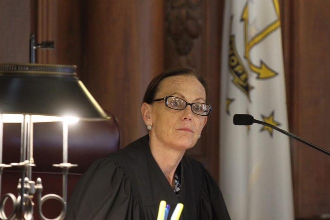 Judge Sarah Taft-Carter, shown in this May 2015 photo at the hearing to determine the fairness of the proposed pension settlement.