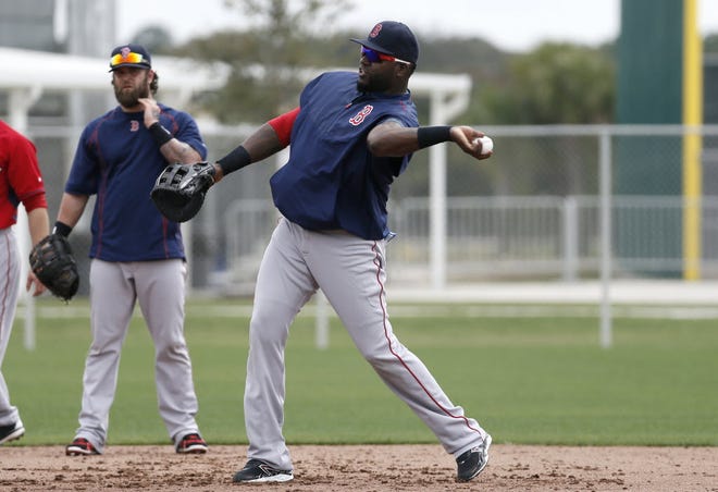 David Ortiz works out at first base during spring training in February. The Boston DH played first base for the second time this week on Wednesday night.