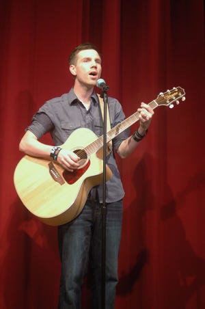 The show includes Christopher Robinson on guitar.