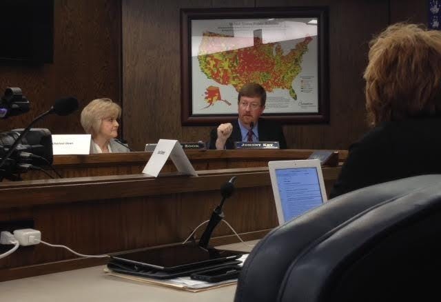John Lyon • Arkansas News Bureau 
State Education Commissioner Johnny Key speaks during a meeting of the state Board of Education on Thursday, July, 9, 2015, as board member Diane Zook looks on.