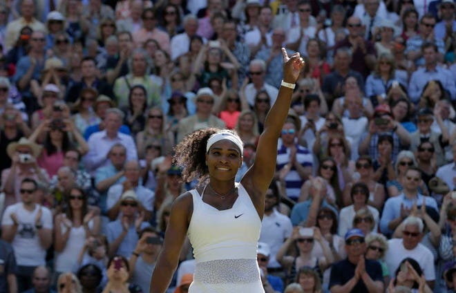 Serena Williams of the United States celebrates as she defeats Maria Sharapova of Russia in their women's singles semifinal match at the All England Lawn Tennis Championships in Wimbledon, London, Thursday July 9, 2015. Williams won 6-2, 6-4.
