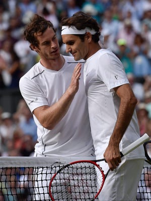 Roger Federer, right, is congratulated by Andy Murray after winning their Wimbledon singles semifinal match 7-5, 7-5, 6-4 on Friday. Federer, the No. 2 seed, faces Novak Djokovic, the No. 1 seed, in Sunday's final. Djokovic beat Richard Gasquet 7-6 (2), 6-4, 6-4. The Associated Press