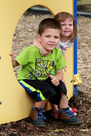JAMIE MITCHELL • TIMES RECORD Haiden Curry, 5, and his sister Erica Maxey, 2, take a rest while playing, Thursday, July 09, 2015, in the children's area at Carrol Ann Cross Park. Haiden and Erica are the children of Karyssa and Tyler Maxey of Van Buren. 
 JAMIE MITCHELL • TIMES RECORD La'niyah Martinez takes a ride on the rocking frog, Thursday, July 09, 20015, while visiting Carrol Ann Cross Park with her parents, Emmanuel Martinez and Tianna Jackson. 
 JAMIE MITCHELL • TIMES RECORD Mason Goines makes his way around the corkscrew slide, Thursday, July 09, 2015, at the children's play area in Carrol Ann Cross Park. Mason is the 4-year-old son of Nichol and Matt Goines of Fort Smith.