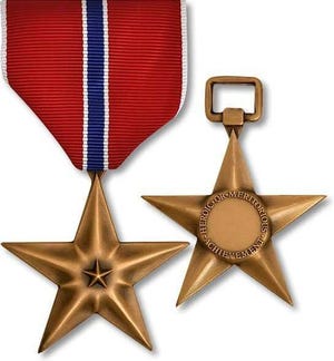 Bronze Star -- $22.00 Northwest Territorial Mint. It provides about 40 % of the U.S. military's medals, according to Ross Hansen, Mint Master (director of the mint).  https://store.nwtmint.com/Military_Awards/  The hierarchy of U.S. Army awards for valor in combat is as follows:  1.    Medal of Honor 2.    Distinguished Service Cross 3.    Silver Star 4.    Bronze Star with "V" device