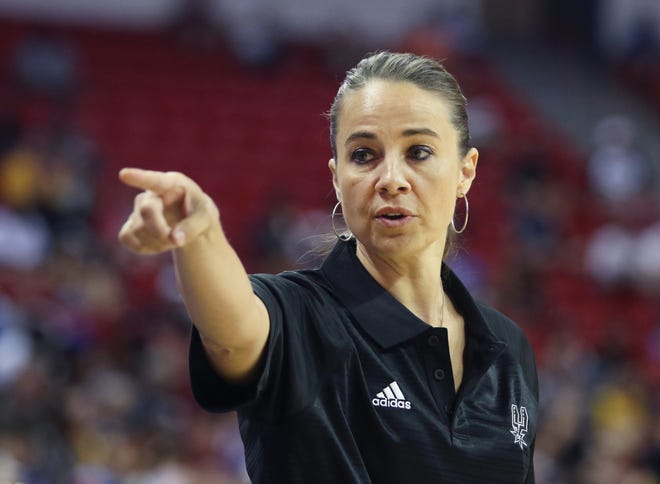 Becky Hammon coaches the San Antonio Spurs during an NBA summer league basketball game against the New York Knicks on Saturday, July 11, 2015, in Las Vegas.