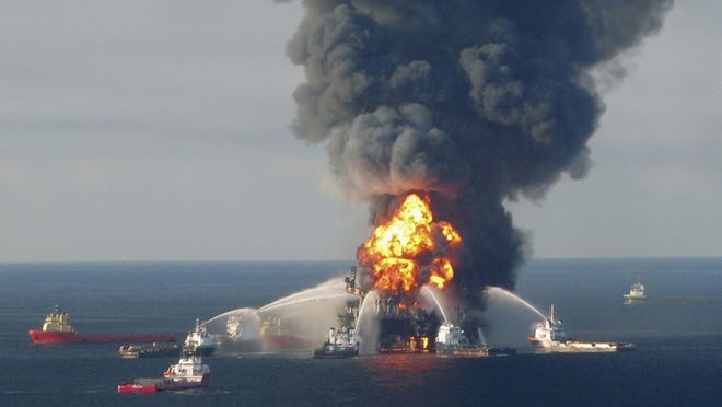In a handout image from the U.S. Coast Guard, the Deepwater Horizon oil rig burns in the Gulf of Mexico on April 21, 2010. (U.S. Coast Guard via The New York Times)