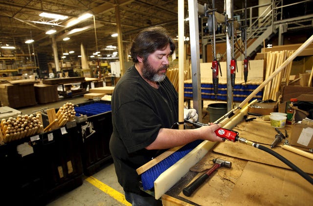 Reuters
Assembly worker Brian August attaches wooden handles to broom brushes to ready them for shipping to clients at Detroit Quality Brushes in Livonia, Mich., on Friday. 
 Reuters
A "Proudly made in the USA" logo is seen on the packaging of a brush produced at Detroit Quality Brushes in Livonia, Mich., on Friday. 
 Reuters
Assembly worker Hester Burgess readies "deck brushes" for shipping to clients at DQB Manufacturing Company in Livonia, Mich., on Friday. 
 Reuters
Assembly worker Damien Jones attaches wooden handles to broom brushes to ready them for shipping to clients at Detroit Quality Brushes in Livonia, Mich., on Friday.