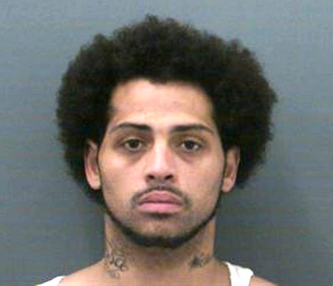 This undated photo provided Friday, June 28, 2013, by the Connecticut Department of Correction shows Carlos Ortiz, 27, of Bristol, Connecticut.