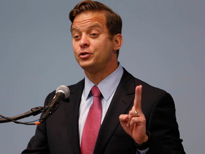 Lt. Gov. Carlos Lopez Cantera addresses 2014 Business Convention for the Americas, sponsored by Puerto Rican/Hispanic Chamber of Commerce at the Lakeland Center in Lakeland Fl. October 17th 2014. The Ledger/Calvin Knight .
