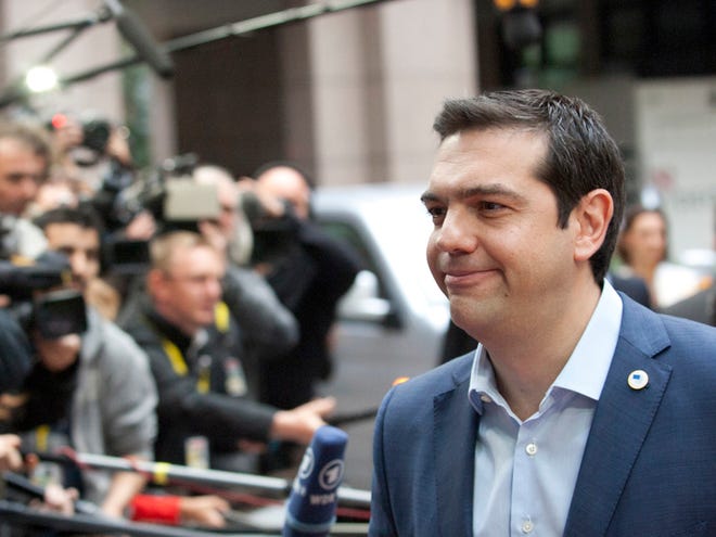 Greek Prime Minister Alexis Tsipras arrives for a meeting of eurozone heads of state at the EU Council building in Brussels on Sunday.