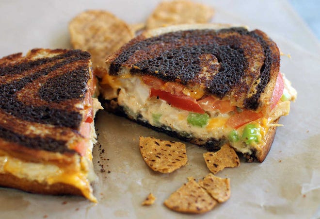 This photo taken June 22, 2015, shows griddled chicken salad sandwich on rye in Concord, NH. This dish is from a recipe by J.M. Hirsch. (AP Photo/Matthew Mead)
