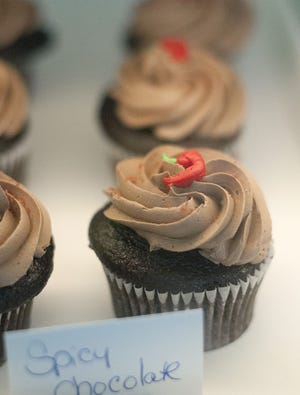 Spicy chocolate cupcakes with cayenne pepper are on display at Shannon Ferrari's bakery, Shannon's Sweet Shoppe, in Middletown. The bakery specializes in making gluten free bakery items in addition to regular bakery items.