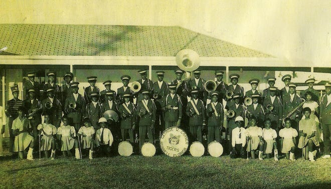 Members of the George W. Carver High School band in full marching regalia. Flagler County Historical Society