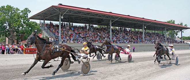 Ray Schnittker wins a race at the Goshen Historic Track during Race Week with trotter Kaliska. Photo by Mark Hall