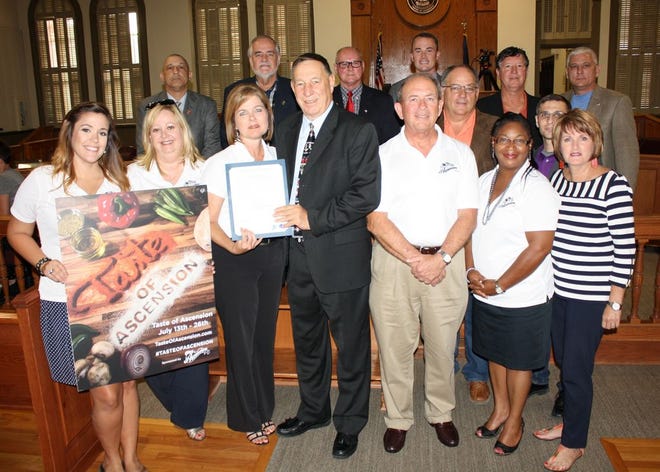 Shown from left to right, first row: Kylie Gravois, Tina Bouchereau, Tracy Browning, Ascension Parish President Tommy Martinez, Randall Lejeune, Anita Cann and Parish Councilwoman Teri Casso. Second row from left: Parish Councilman Todd Lambert and Parish Councilman Bryan Melancon. Third row, from left: Parish Councilman Oliver Joseph, Parish Councilman Daniel “Doc” Satterlee, Parish Council Chairman Randy Clouatre, Parish Councilman Chris Loar, Parish Councilman Kent Schexnaydre and Parish Councilman Benny Johnson.