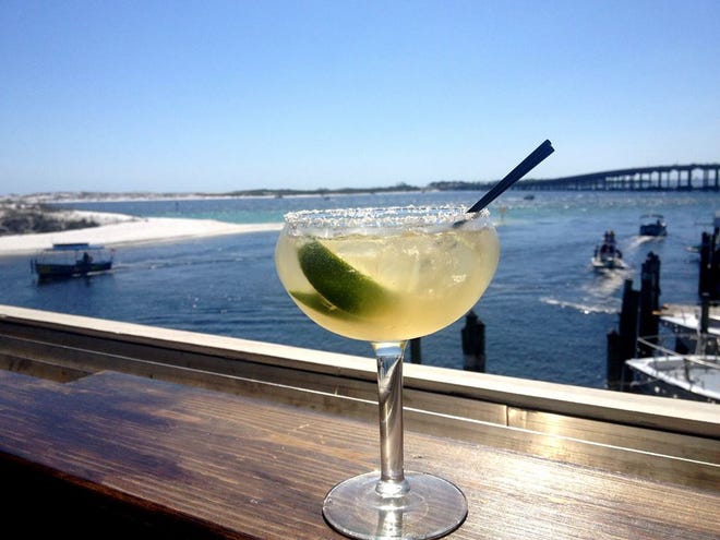 To find your perfect happy hour, take a stroll through HarborWalk Village and soak up some sun.