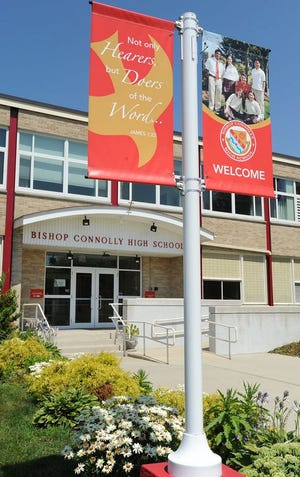 Bright banners and blooming flowers welcome all to Bishop Connolly High School.